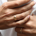 Revere and Co Jewelry. 14K Yellow Gold Custom Classic Signet Ring without Engraving on ring finger