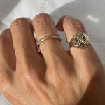 14k solid yellow gold signet ring with bespoke engraving. Initials engraved. Custom design.