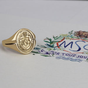 14k solid yellow gold signet ring with bespoke engraving. Custom family crest.