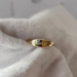 Revere and Co Jewelry. 14K Yellow Gold Custom Band Signet Ring with name engraving in script